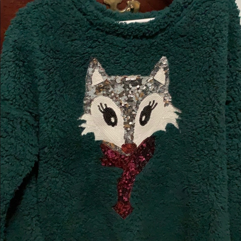 Lady’s fleece sequin top